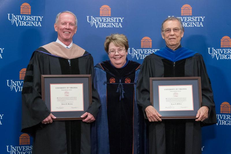 Thomas Jefferson Award winners Robert Sweeney, left, and Jerome McGann flank UVA President Teresa A. Sullivan at the 2016 Fall Convocation