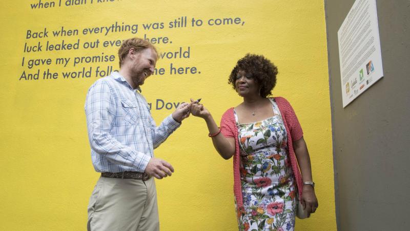 During the dedication, Guinn and Dove each signed the mural, putting the  finishing touch on the project after two months of painting, and many more hours spent  designing and planning the mural.