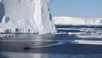 A Kodiak-style boat provides some perspective as to the scale of the Thwaites Glacier. (Photo by Linda Welzenbach, Rice University)