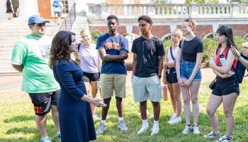 Dean of Arts & Sciences speaking with incoming first-year students