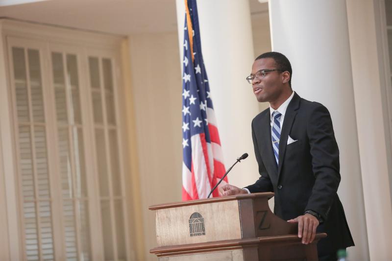 ered Cooper, a third-year student and government major, presents his winning speech. (Photo by Drew Precious)