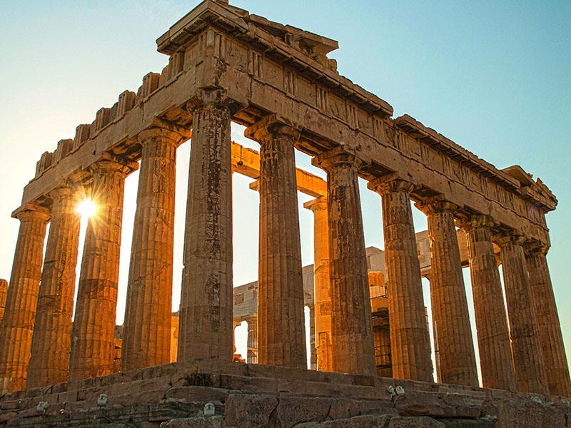 Sunrise image of ancient Greek temple.