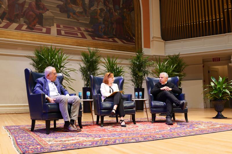 (Left to right) Former Palestinian Authority prime minister Salam Fayyad, A&S senior associate dean Jenn Bair and New York Times columnist Tom Friedman discuss the Israel-Hamas conflict from the stage of Old Cabell Hall.