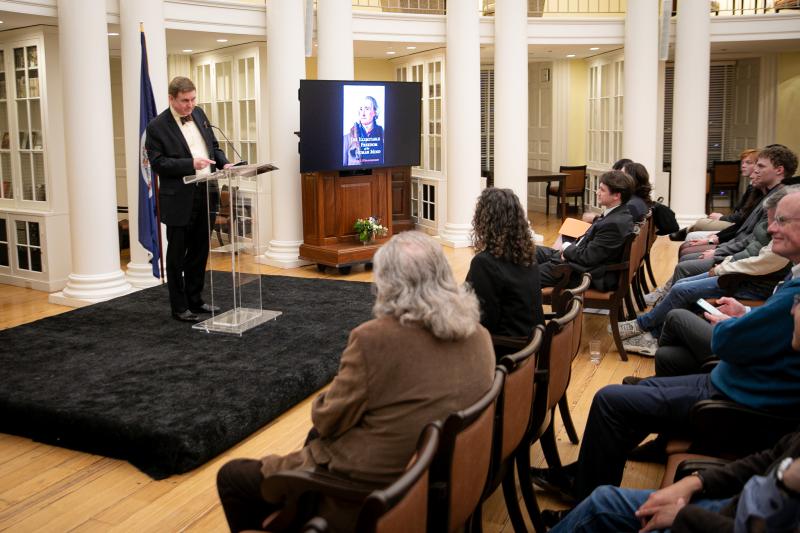 UVA history professor Andrew O'Shaughnessy stands before an audience delivering a history lecture on the founding of the University of Virginia.