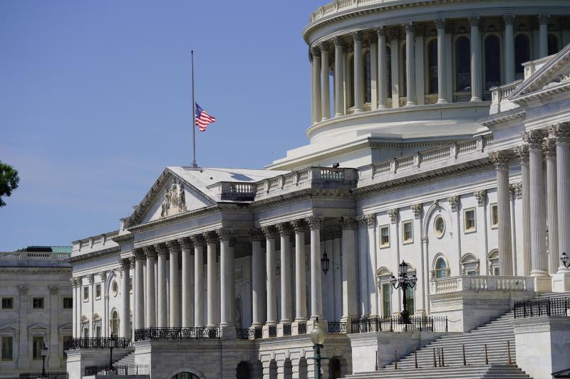 Washington, DC – July 21, 2020: The American flag at half staff on the U.S. Capitol at the death of Congressman John Lewis (D-GA).