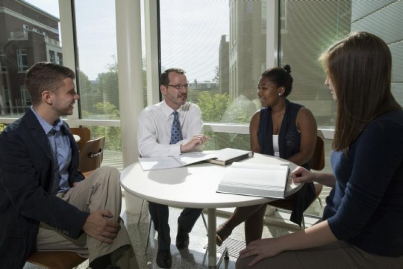 Dean Ian Baucom with students