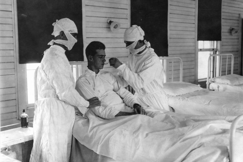 An influenza patient receives treatment at the U.S. Naval Hospital in New Orleans, Louisiana, in 1918.