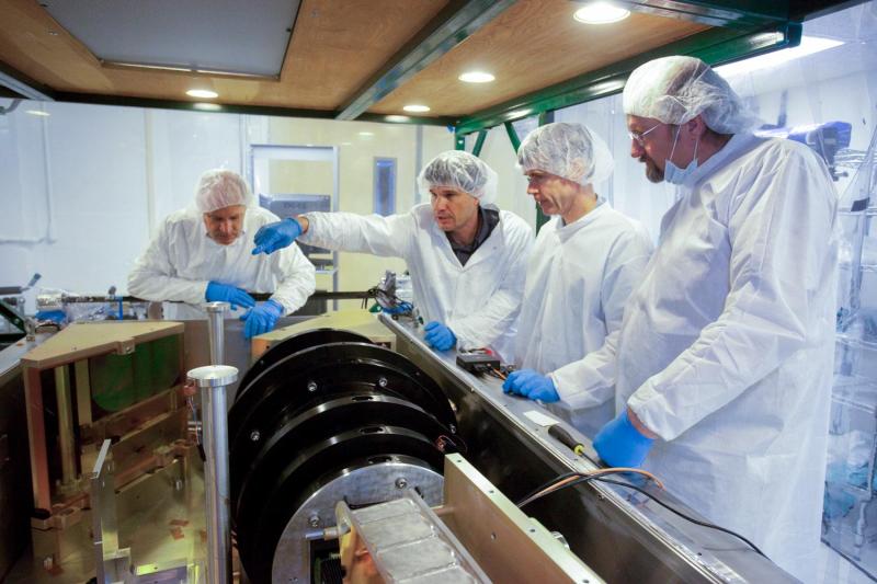 Wilson, second from left, and the UVA APOGEE team with the spectrograph before its final installation in New Mexico.