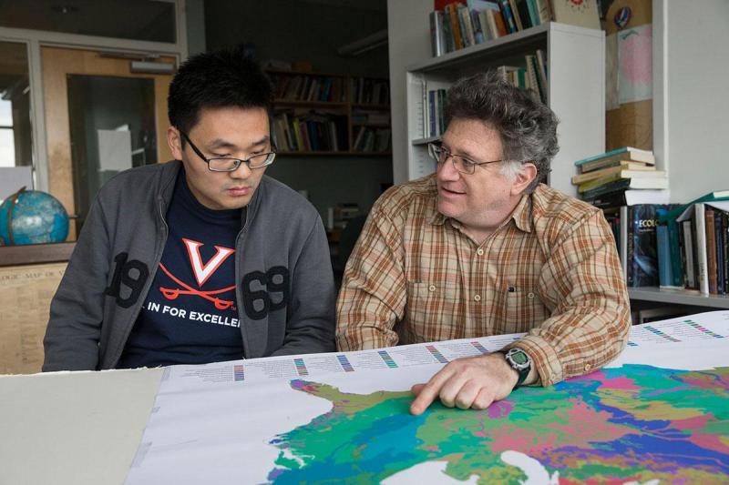 Environmental scientist Manuel Lerdau, right, and Ph.D. candidate Bin Wang took a closer look at the effects of surface ozone on forests.
