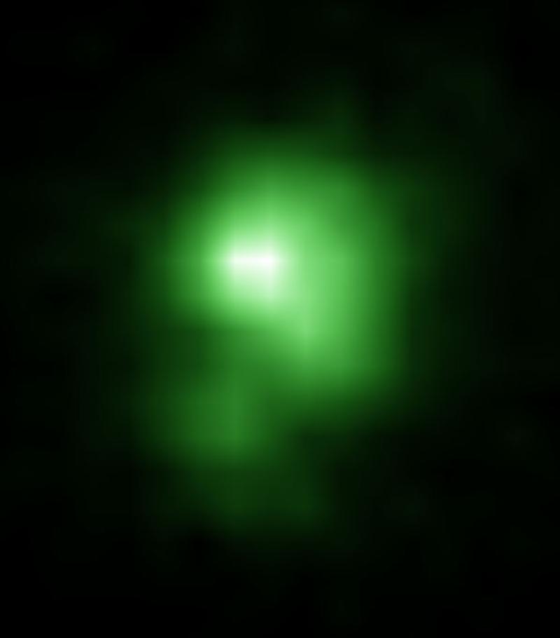 A Hubble Space Telescope image of the compact green pea galaxy J0925+1403. The diameter of the galaxy is approximately 6,000 light years, and it is about twenty times smaller than the Milky Way. 
