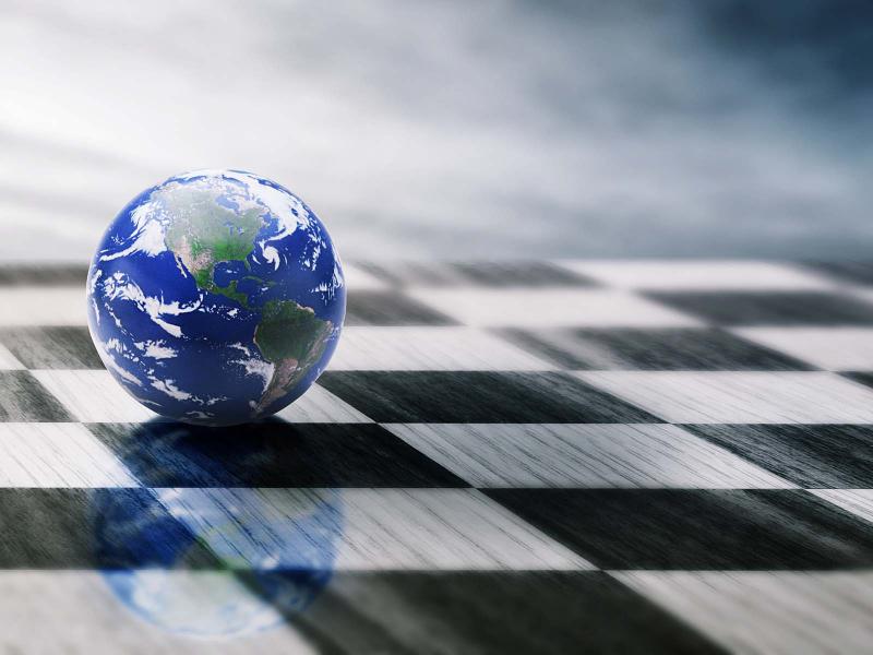 A globe on a checkerboard