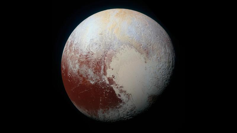 New Horizons captured this high-resolution, enhanced-color view of Pluto on July 14, combining blue, red and infrared images taken by the Ralph/Multispectral Visual Imaging Camera.
