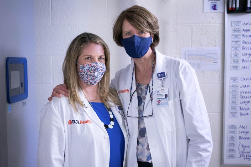 Under the guidance of the Be SAFE Lab’s project manager Melissa Henriksen, right, and Becca Latimer, director of proposal development in the Office of the Vice President for Research, left, the lab played a critical role in identifying a dramatic spike in