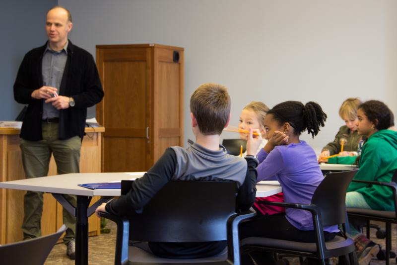 Math professor Slava Krushkal with 4th- and 5th-grade students in class at the UVA Math Circle program. 