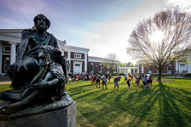 Students rehearse for a dance performance on the Lawn.